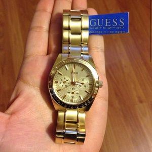 Gold GUESS watch